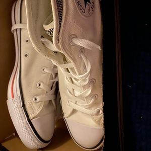 Clean white high top Converse with coral trim